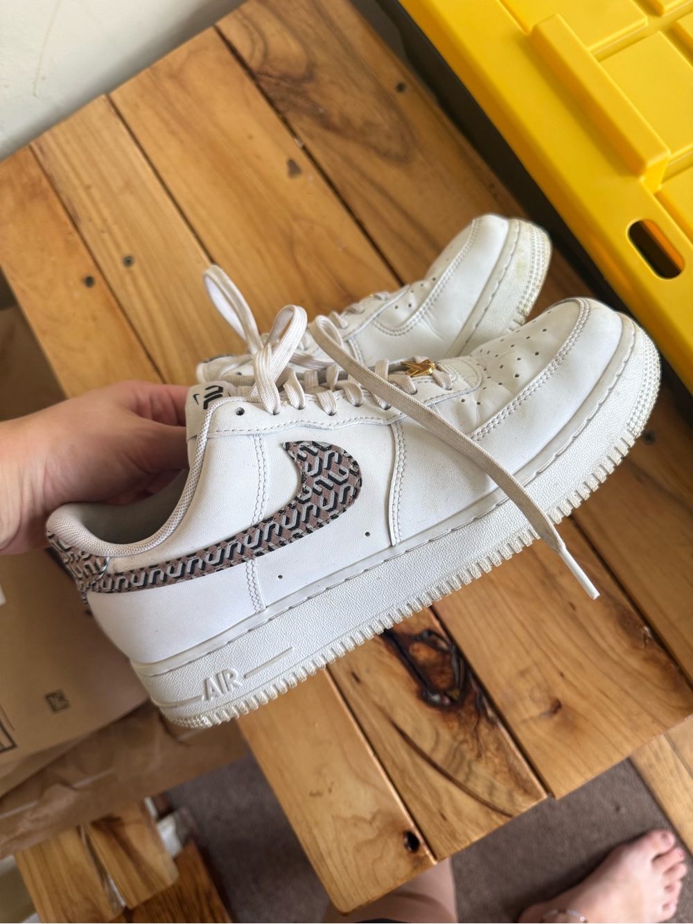 Nike White Low-Top Sneakers with Brown Patterned Swoosh